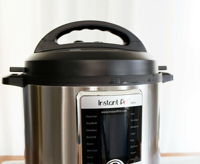 Affordable Instant Pot on a kitchen counter, demonstrating ease in cooking with its sleek design and multiple functions.