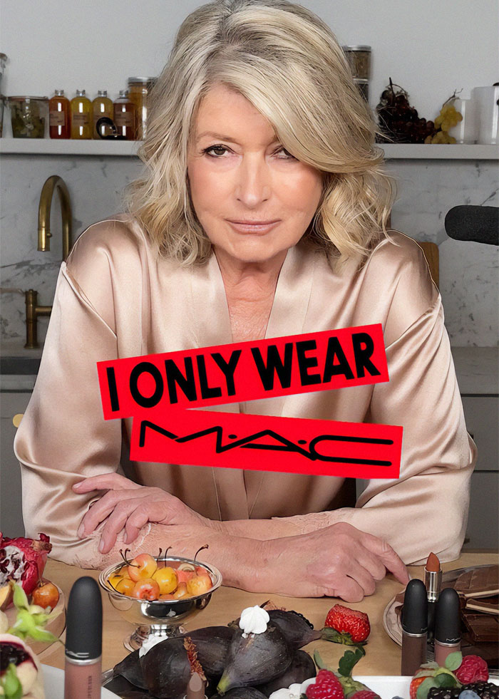 Martha Stewart posing with MAC Cosmetics, wearing a satin robe, surrounded by fruit and makeup products. Martha Stewart posing with MAC Cosmetics, wearing a satin robe, surrounded by fruit and makeup products.