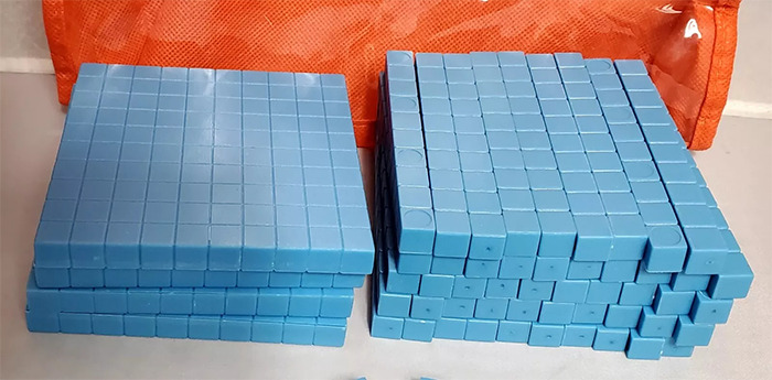 Old-school educational blocks arranged in stacks, evoking memories of classic learning tools.