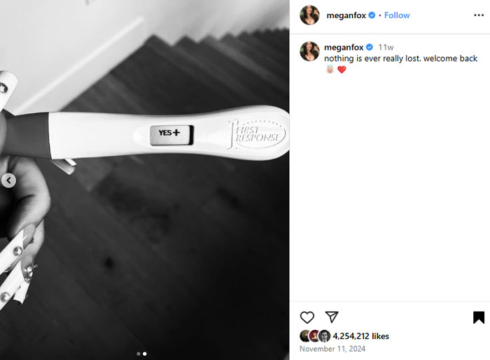 A hand holding a pregnancy test with a positive result, related to Megan Fox kids and parenting. A hand holding a pregnancy test with a positive result, related to Megan Fox kids and parenting.