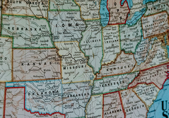 Close-up of a Midwest USA map, highlighting states like Missouri and Iowa, illustrating what's normal for US citizens.