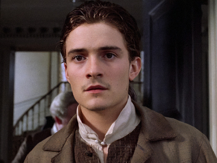 Orlando Bloom in historical attire, indoors, from Pirates of the Caribbean. Orlando Bloom in historical attire, indoors, from Pirates of the Caribbean.
