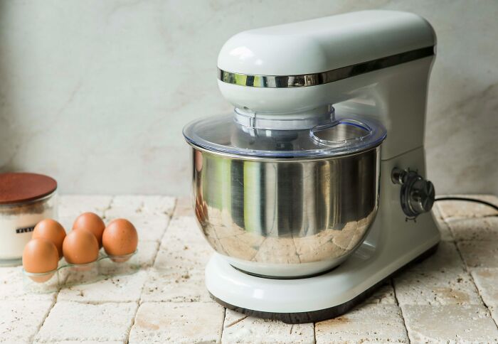 "Stand mixer on a kitchen counter with eggs, a time and space-saving purchase favored by netizens."