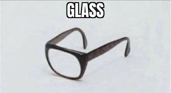 Meme with glasses missing lenses, captioned "GLASS," highlighting a humorous linguistic twist.