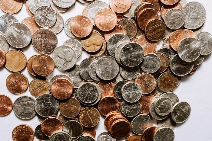 Coins scattered on a surface.
