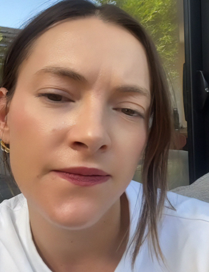 Woman looking frustrated after being asked a relationship question in a job interview.