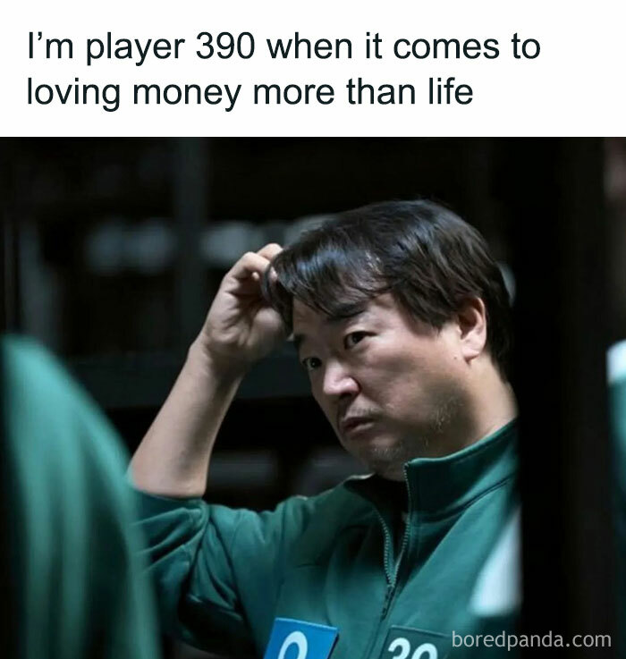 Man in green tracksuit from Squid Game, with hand on head, expressing confusion, captioned about loving money more than life.