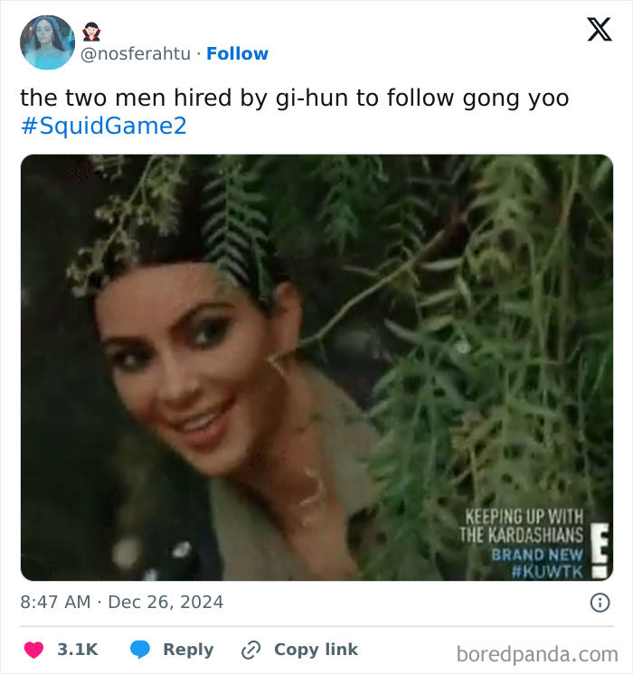 Person peering through leaves with a mischievous expression, referencing "Squid Game 2" in a humorous context.