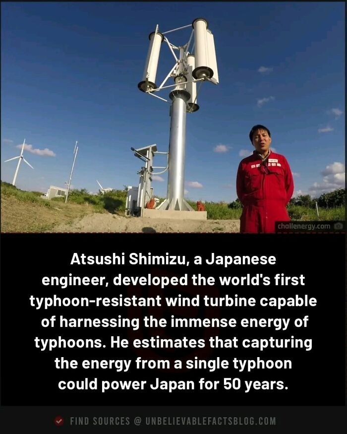 Japanese engineer by typhoon-resistant wind turbine, showcasing renewable energy innovation.
