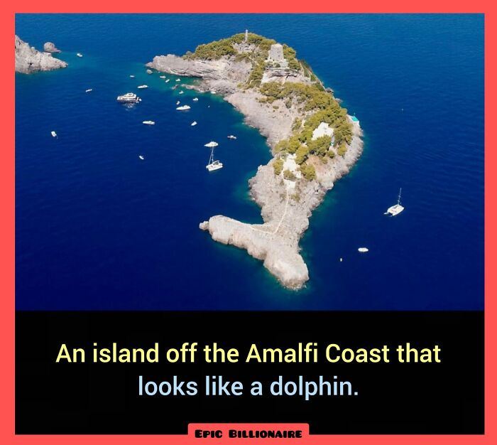 Island resembling a dolphin off the Amalfi Coast, surrounded by the sea and boats; a fascinating fact for your brain.
