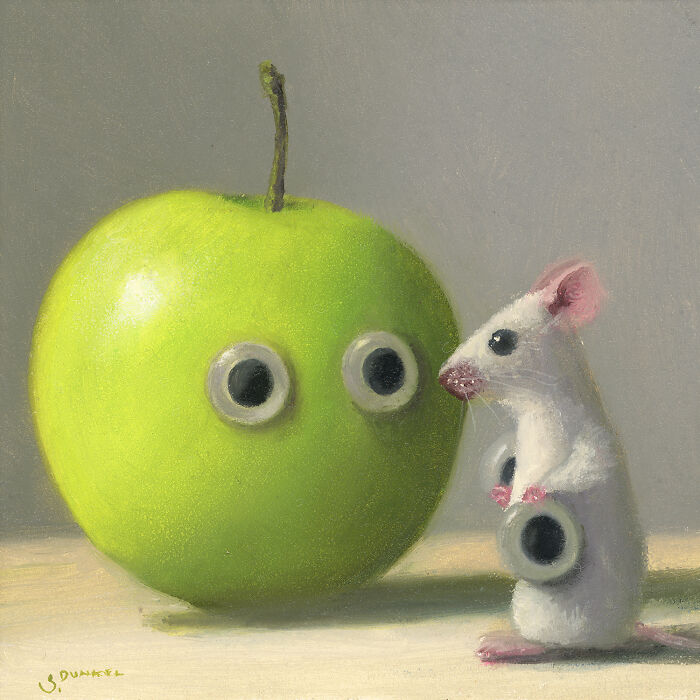 Mouse painting depicts a white mouse holding googly eyes with a green apple, showcasing adorable shenanigans.