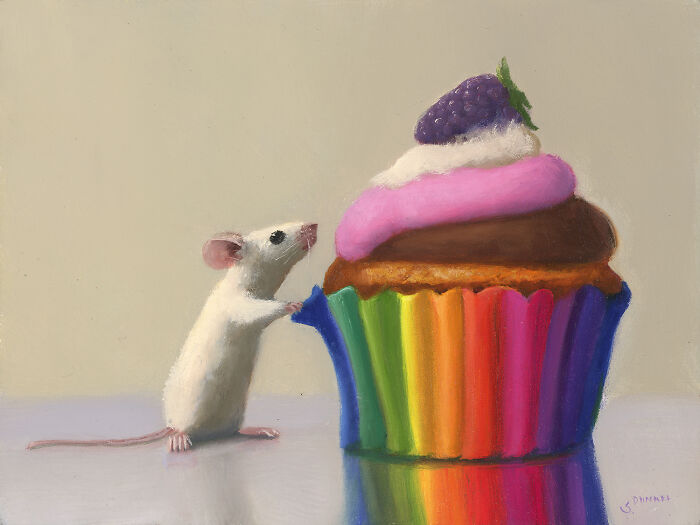 A painting of a cute mouse admiring a large cupcake with rainbow wrapper and berry topping.