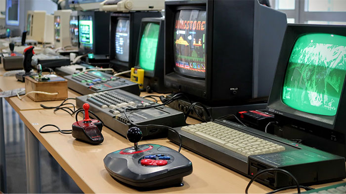 Retro computers and gaming consoles displayed, illustrating true urban legends in technology.