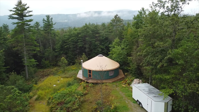 Yurt in a forested area, built by a couple living off-grid. Yurt in a forested area, built by a couple living off-grid.