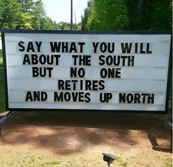 Sign displaying a funny message about retiring in the South for a humorous and bizarre photo.
