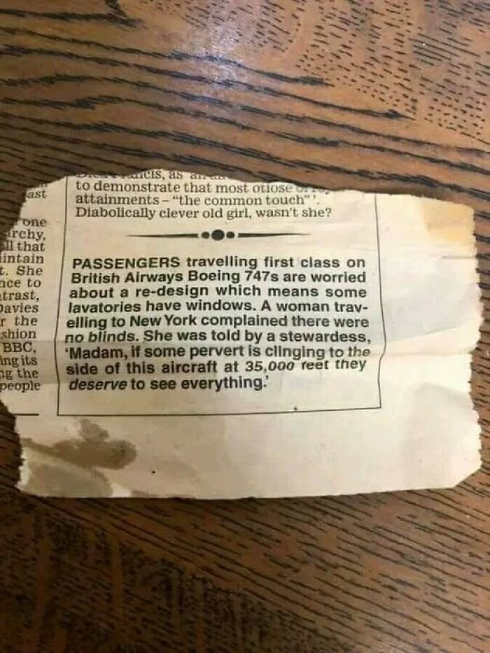 Newspaper clipping with text about bizarre airplane lavatory windows.