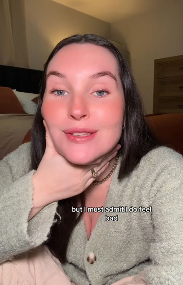 Woman discussing accidentally choosing baby&rsquo;s name, Pearl, for her dog in a cozy room setting.