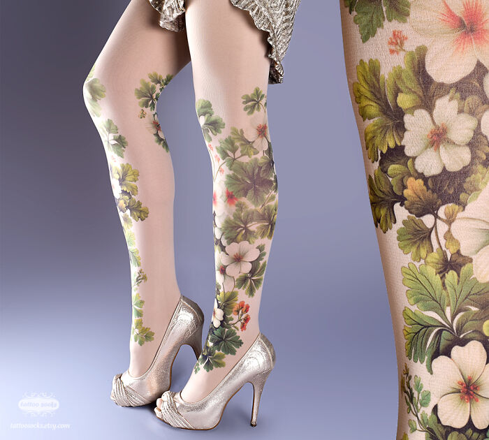 Unique tattoo tights with floral patterns, paired with silver high heels against a gray background.