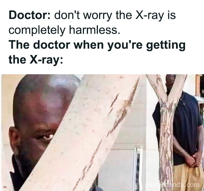 Man humorously hiding behind a tree, illustrating a doctor's reaction, featuring funny meme content.