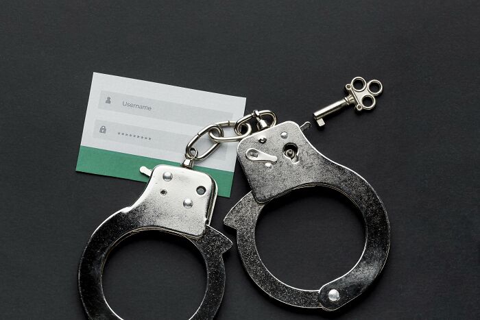 Handcuffs and a computer password hint at pop culture mysteries.