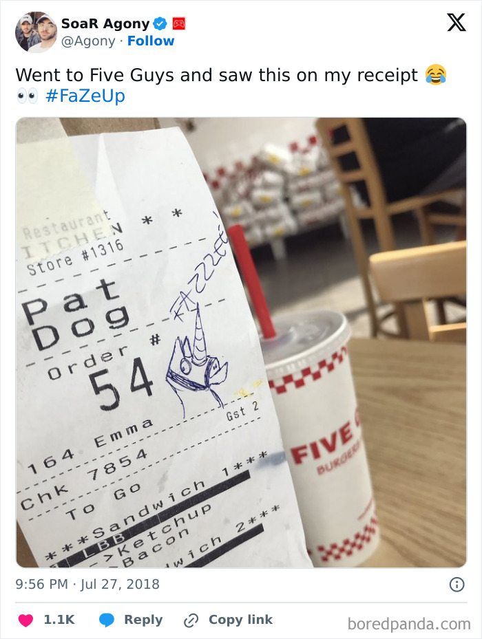 Interesting receipt from Five Guys featuring a doodle and humorous order name, with a drink cup in the background.