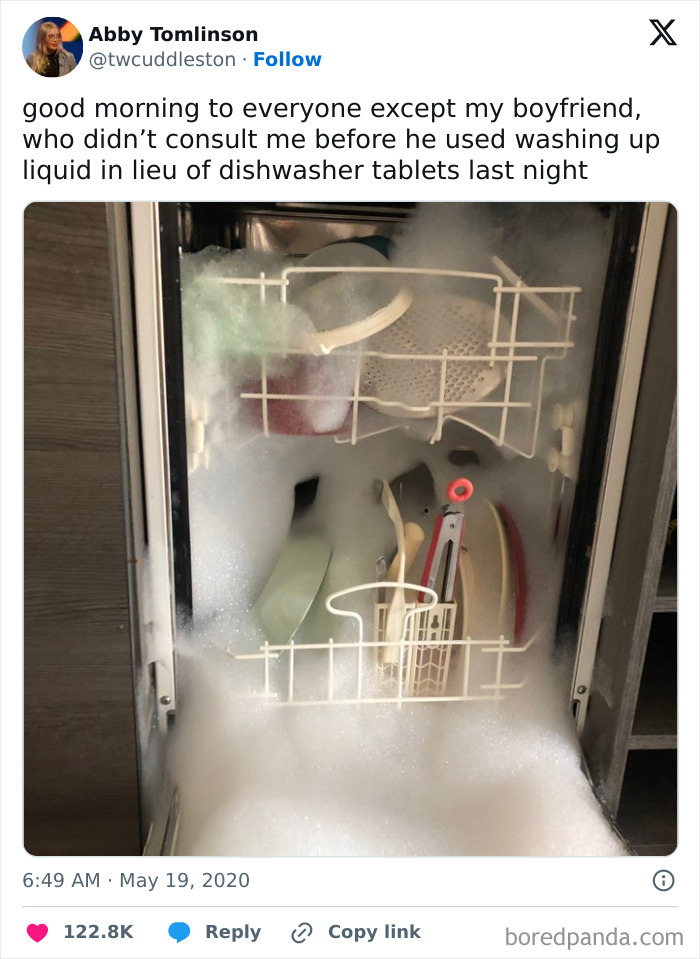 Overflowing dishwasher filled with bubbles, illustrating a common mistake by boyfriends or husbands.