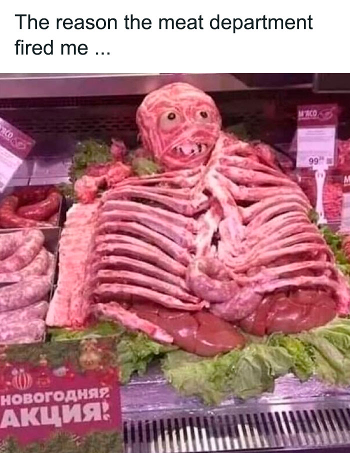 Weird image of a meat display arranged to resemble a skeleton, surrounded by sausages and greenery in a store setting.