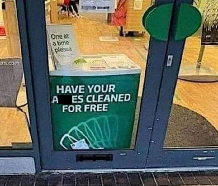 Sign on a shop door humorously offers free services, aligning with weird images worth seeing.