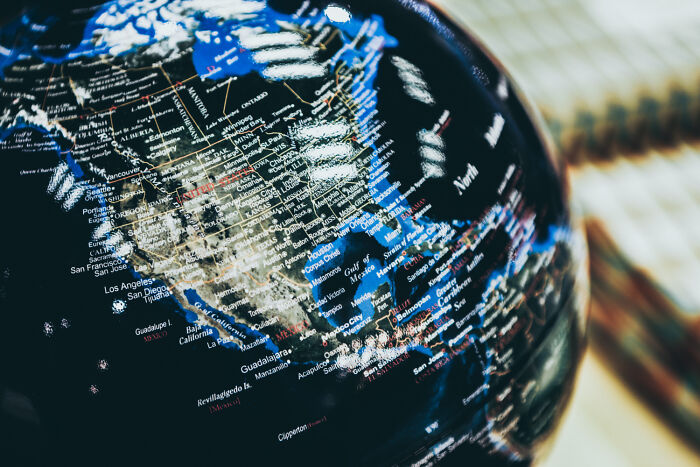 Close-up of a globe showing the USA map, highlighting common things that confuse foreigners.