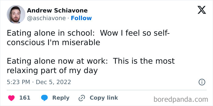 Tweet about eating alone at work vs. school, highlighting relatable experiences in today's workforce.