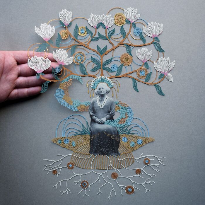 Intricate paper art design depicting a woman with floral and root patterns, showcasing nature-inspired creativity.