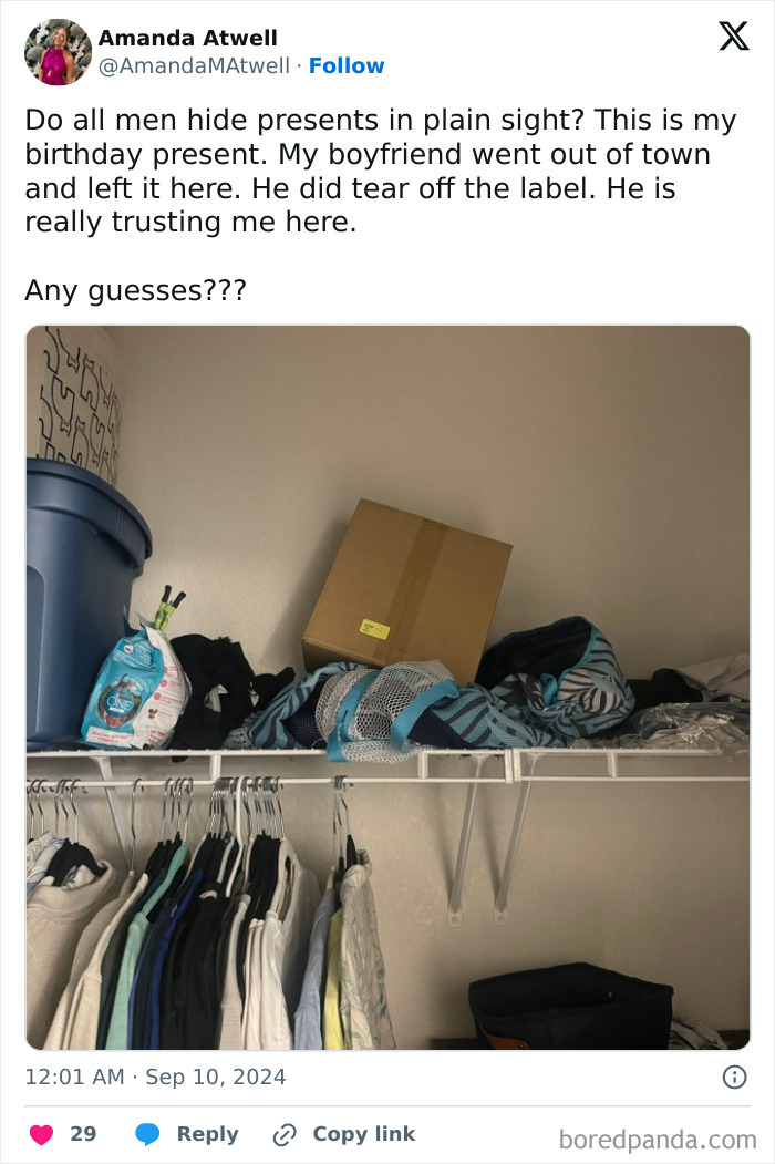 Brown box hidden in closet by boyfriends, surrounded by clothes and storage items.