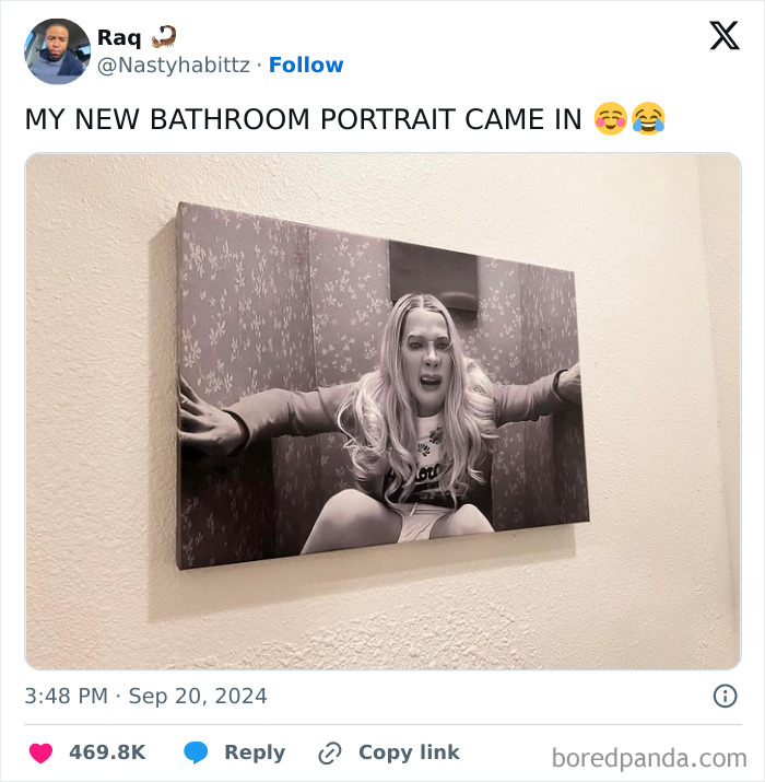Black culture humor with a canvas print of a woman reacting dramatically in a bathroom setting.