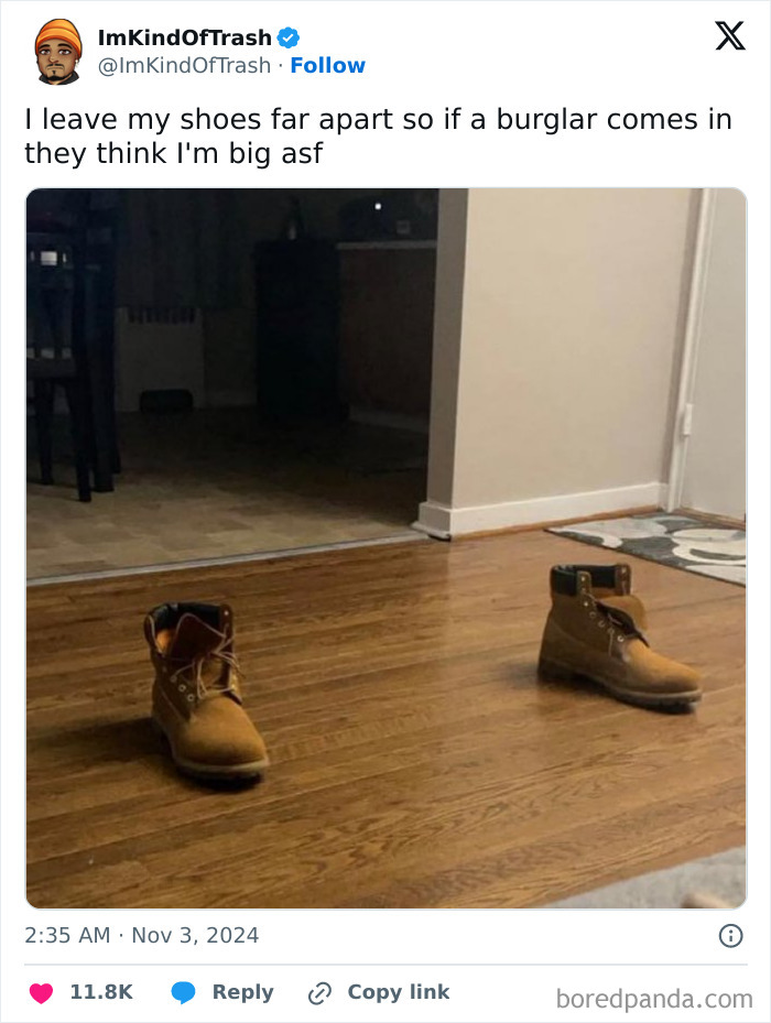 Tweet humorously celebrates Black culture with boots placed far apart on a wooden floor.
