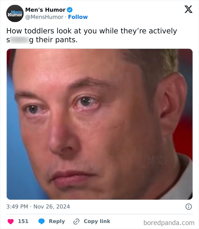 Close-up of a man with a serious expression, captioned with a humorous take on toddler behavior, highlighting men's humor.