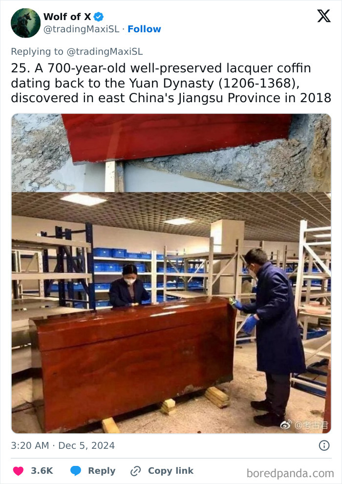 Ancient lacquer coffin from Yuan Dynasty unearthed in Jiangsu, China, with people examining its preservation.