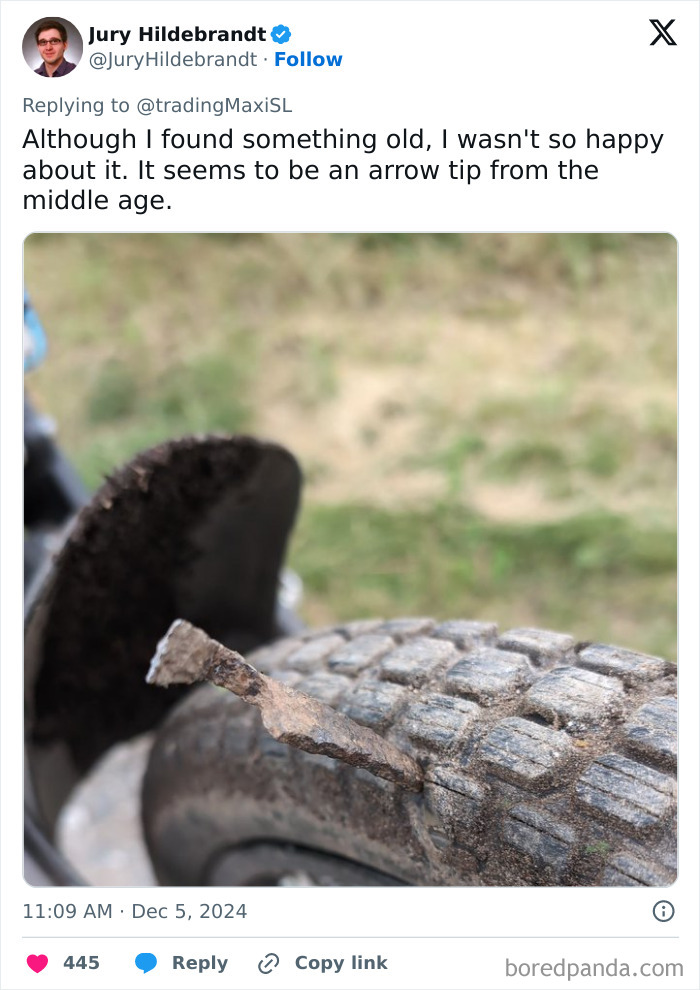 Ancient arrow tip lodged in a bicycle tire, a fascinating archaeological find from recent years.