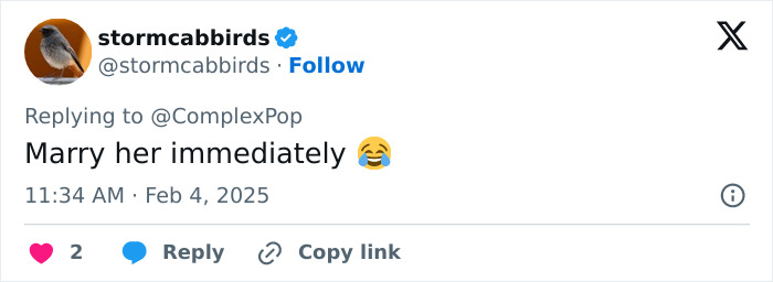 Text from a tweet saying, "Marry her immediately" with a laughing emoji. Text from a tweet saying, "Marry her immediately" with a laughing emoji.