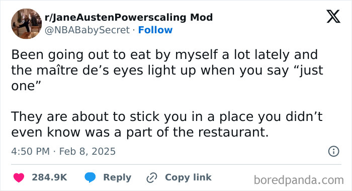 Funny February tweet about dining alone and unusual restaurant seating.