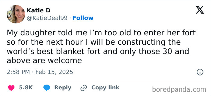 Tweet from a parent humorously planning a blanket fort, inspired by their child’s age restriction rule.