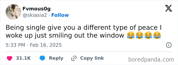 Tweet about single life with laughing emojis, celebrating Black culture humorously.