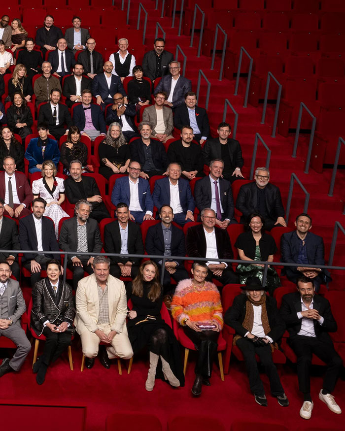 Group of 2025 Oscars nominees sitting in theater chairs. Group of 2025 Oscars nominees sitting in theater chairs.
