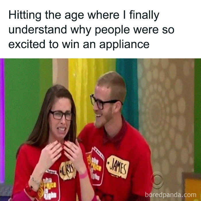 Two people in a game show setting celebrate, highlighting dad's humor about winning an appliance.