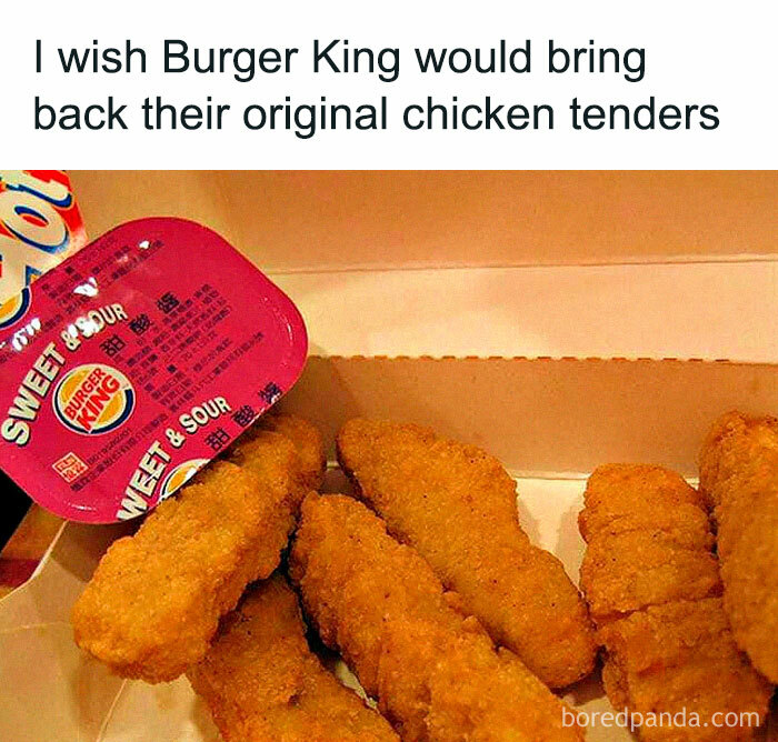 Burger King chicken tenders and sweet and sour sauce evoke 2000s nostalgia in an open box.