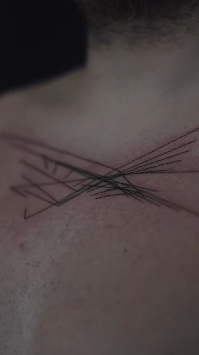 Abstract tattoo representing unique brain activity imprint on skin.