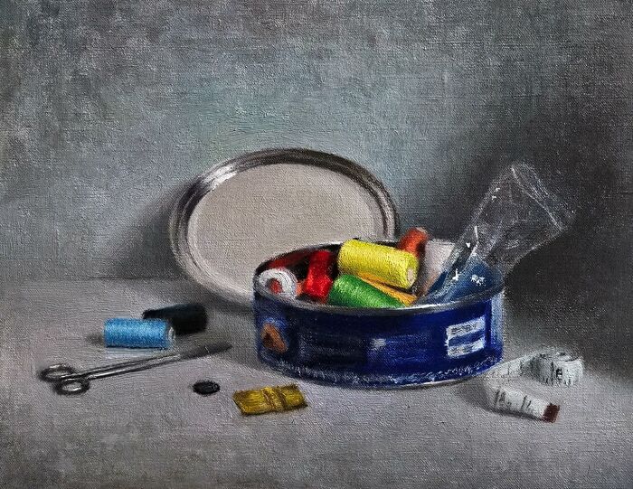 Oil painting of sewing supplies, showcasing Eastern Europe's nostalgia with a blue tin, colorful threads, scissors, and tape.
