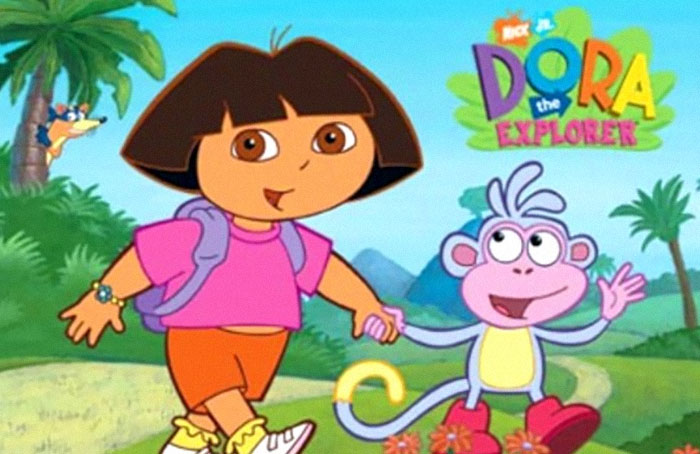 Dora la Exploradora y Botas en un paisaje tropical, imagen colorida de la serie infantil.