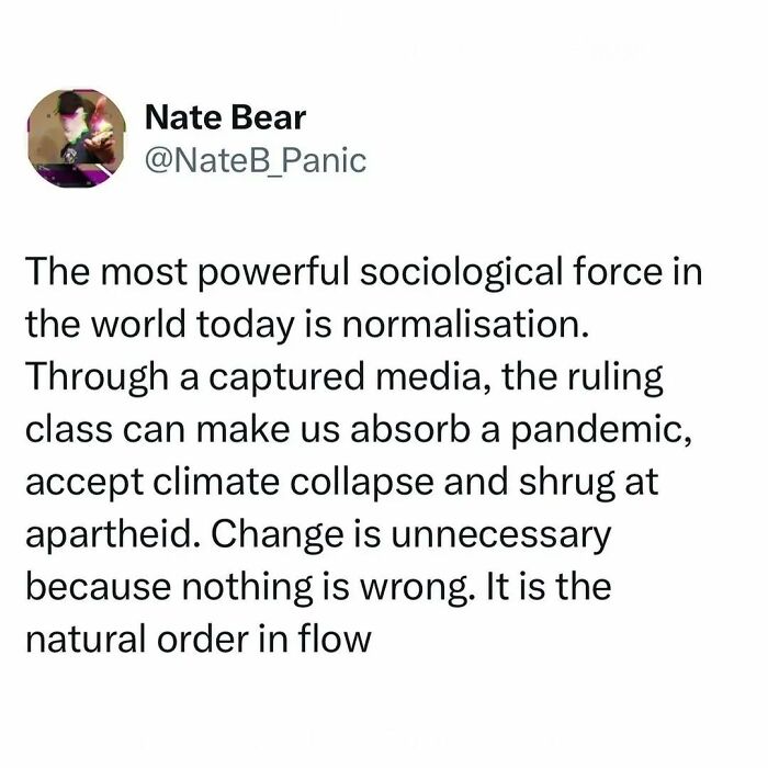 Text post by Nate Bear questioning capitalism's impact through media normalization.