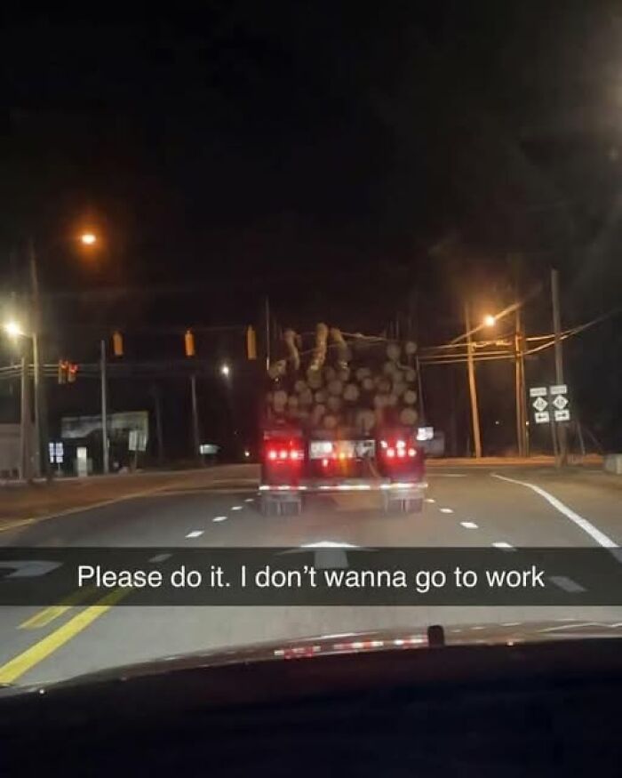 Logging truck at night with humorous text about mental health memes, expressing a work-related sentiment.