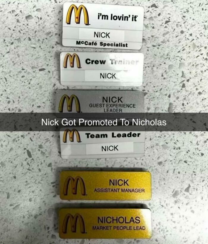 Promotional name tags showing Nick's career progress at McDonald's, for daily dose of positivity.